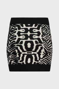 Maya is wearing a size S Nurture Mini Skirt in Recycled Cashmere in color Black by LITA, view 9