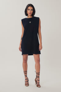Cam is wearing a size S Muscle Tee Dress in Sustainable Cotton in color Black by LITA, view 1