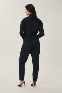 Annaly is wearing a size S Born Free Jumpsuit in Cotton in color Black by LITA, view 9