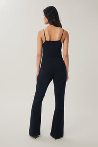 Annaly is wearing a size S New Tie-Front Solid Jumpsuit in Viscose Crepe in color Black by LITA, view 4