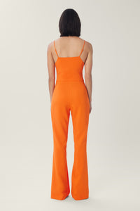 Cam is wearing a size S New Tie-Front Solid Jumpsuit in Viscose Crepe in color Cherry Tomato by LITA, view 9