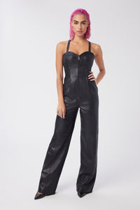 Cam is wearing a size XS Spellbound Leather Jumpsuit in Leather in color Black by LITA, view 1
