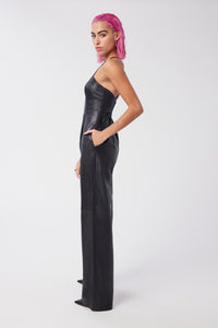 Cam is wearing a size XS Spellbound Leather Jumpsuit in Leather in color Black by LITA, view 4