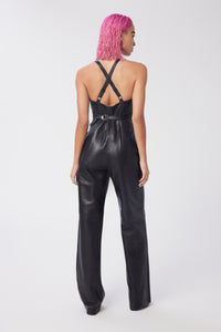 Cam is wearing a size XS Spellbound Leather Jumpsuit in Leather in color Black by LITA, view 5