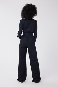 Imoni is wearing a size S Trench Jumpsuit in Stretch Twill Cotton in color Black by LITA, view 4