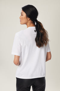Annaly is wearing a size S Boxy Shoulder Pad Tee in Cotton in color White by LITA, view 20