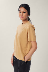 Annaly is wearing a size S Boxy Shoulder Pad Tee in Cotton in color Iced Coffee by LITA, view 13