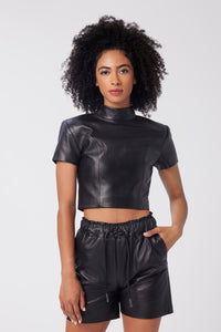 Imoni is wearing a size XS Cropped Strong Shoulder Tee in Leather in color Black by LITA, view 7