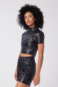 Imoni is wearing a size XS Cropped Strong Shoulder Tee in Leather in color Black by LITA, view 8