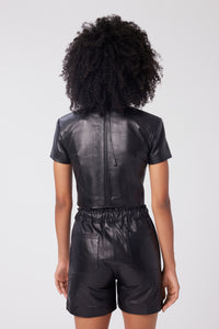 Imoni is wearing a size XS Cropped Strong Shoulder Tee in Leather in color Black by LITA, view 10