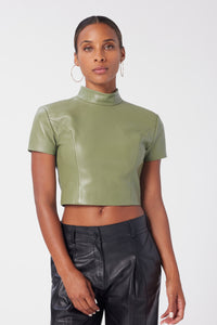 Aunjoli is wearing a size S Cropped Strong Shoulder Tee in Leather in color Olive by LITA, view 1