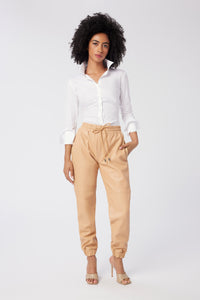 Imoni is wearing a size S Connection Woven Shirt in Cotton in color White by LITA, view 2