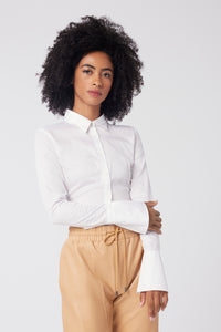Imoni is wearing a size S Connection Woven Shirt in Cotton in color White by LITA, view 1