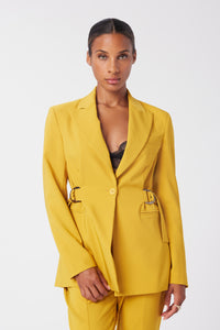 Aunjoli is wearing a size S D-Ring Blazer in Crepe Georgette in color Saffron by LITA, view 1