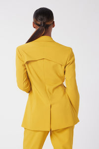 Aunjoli is wearing a size S D-Ring Blazer in Crepe Georgette in color Saffron by LITA, view 4