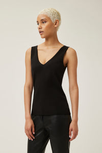 Bella is wearing a size S Lux Knit Tank in Organic Cotton in color Black by LITA, view 2