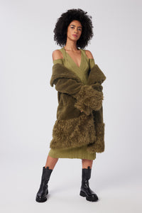 Imoni is wearing a size S Cable Strapped Dress in Merino Wool in color Olive by LITA, view 5