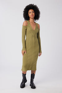 Imoni is wearing a size S Cable Strapped Dress in Merino Wool in color Olive by LITA, view 1
