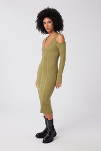 Imoni is wearing a size S Cable Strapped Dress in Merino Wool in color Olive by LITA, view 2