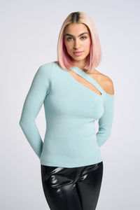 Cam is wearing a size XS Peek Shoulder Sweater in Viscose in color Artic Blue by LITA, view 1