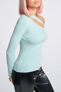 Cam is wearing a size XS Peek Shoulder Sweater in Viscose in color Artic Blue by LITA, view 2