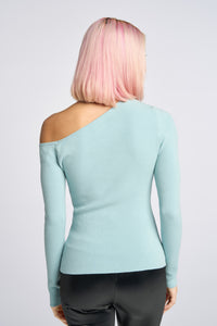 Cam is wearing a size XS Peek Shoulder Sweater in Viscose in color Artic Blue by LITA, view 4