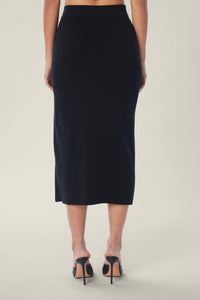 Cam is wearing a size M True Rib Skirt in Cotton in color Black by LITA, view 5