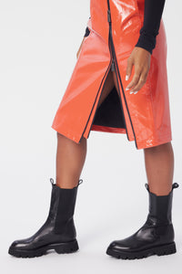 Model is wearing a size 4 Double Zip Skirt in Glazed Leather in color Fiesta by LITA, view 9