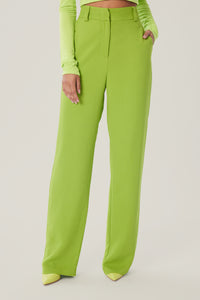 Cam is wearing a size 2 Spark Pant in Viscose Crepe in color Acid Lime by LITA, view 11