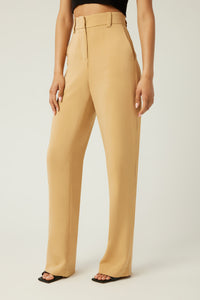 Annaly is wearing a size 4 Spark Pant in Viscose Crepe in color Iced Coffee by LITA, view 17
