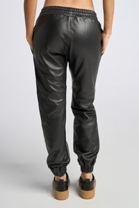 Model is wearing a size XS Jogger in Leather in color Black by LITA, view 8