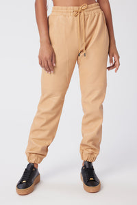 Model is wearing a size S Jogger in Leather in color Doe by LITA, view 1
