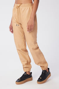 Model is wearing a size S Jogger in Leather in color Doe by LITA, view 2