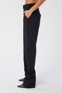 Model is wearing a size 2 Buckled Military Suit Pant in Crepe in color Black by LITA, view 3