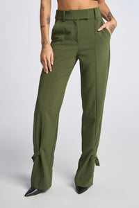 Model is wearing a size 2 Buckled Military Suit Pant in Crepe in color Olive by LITA, view 15