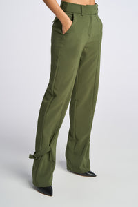 Model is wearing a size 2 Buckled Military Suit Pant in Crepe in color Olive by LITA, view 16