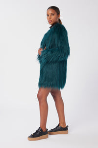 Aunjoli is wearing a size S The Shag Faux Fur Coat in color Deep Teal by LITA, view 7