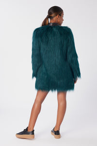 Aunjoli is wearing a size S The Shag Faux Fur Coat in color Deep Teal by LITA, view 9