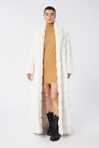 Maya is wearing a size S The Encore Coat in Faux Fur in color White by LITA, view 10