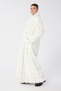 Maya is wearing a size S The Encore Coat in Faux Fur in color White by LITA, view 12