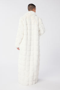 Maya is wearing a size S The Encore Coat in Faux Fur in color White by LITA, view 14