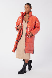 Aunjoli is wearing a size S Puffer Coat in Leather in color Fiesta by LITA, view 2
