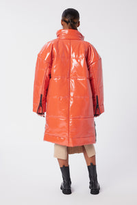 Aunjoli is wearing a size S Puffer Coat in Leather in color Fiesta by LITA, view 4