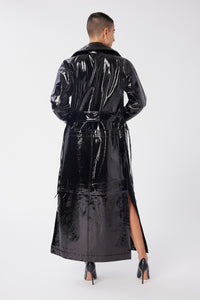 Maya is wearing a size S Trench Coat in Glazed Leather in color Black by LITA, view 5