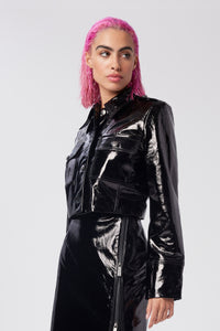 Cam is wearing a size S Cropped Utility Jacket in Glazed Leather in color Black by LITA, view 3