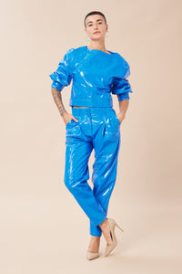 Maya is wearing a size 25 Peg Trouser in Glazed Leather in color Princess Blue by LITA, view 7
