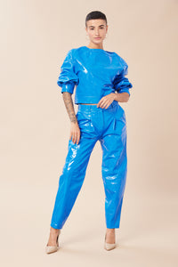 Maya is wearing a size 25 Peg Trouser in Glazed Leather in color Princess Blue by LITA, view 6