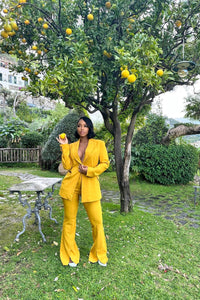 Aunjoli is wearing a size S D-Ring Blazer in Crepe Georgette in color Saffron by LITA, view 9